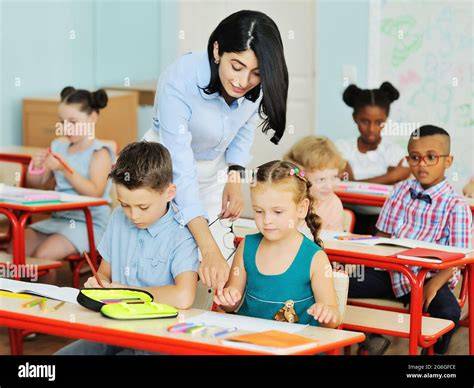 modern classroom with teacher and students